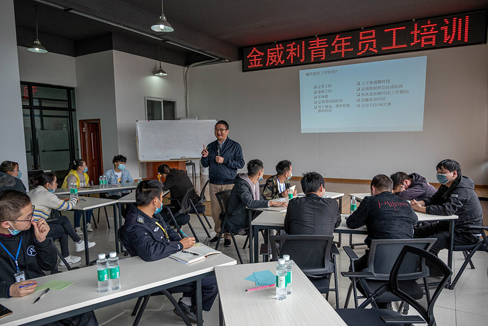 Young workers at a shoe factory in China get career and life skills training